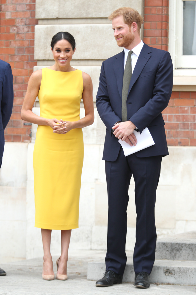 Illustration for article titled Golden Lady: Meghan Markle Just Got Colorful, and We Couldn't Be Happier